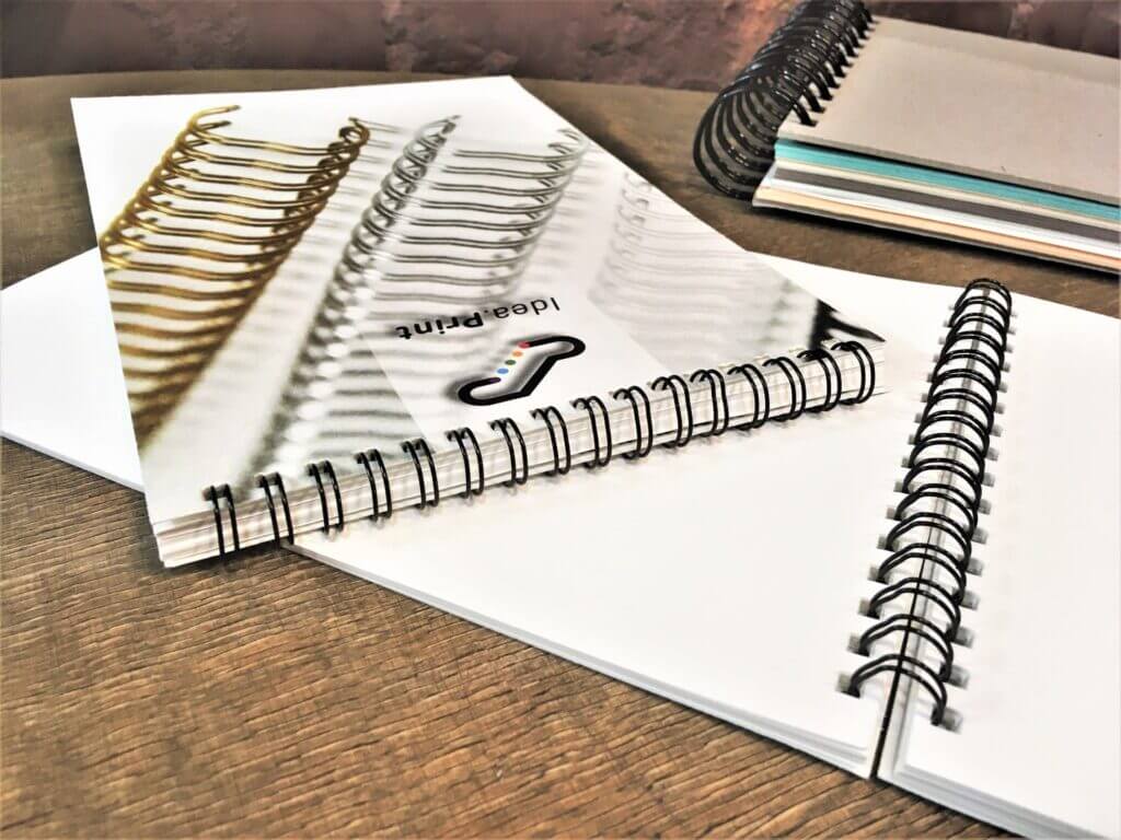 Printing notebooks with a spiral binding